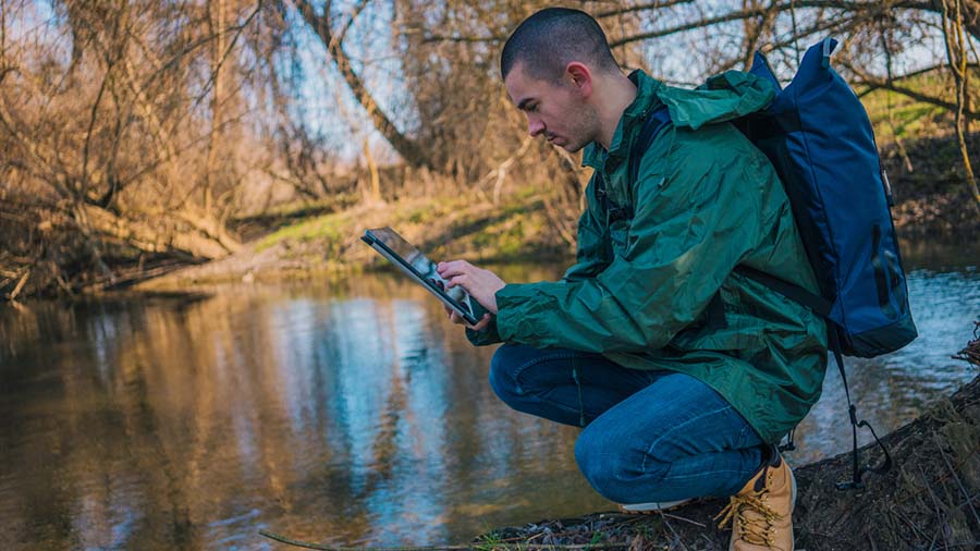 Ecologist Performing Wetland Field Work Using Tablet The Field Record That Shows The Full Picture